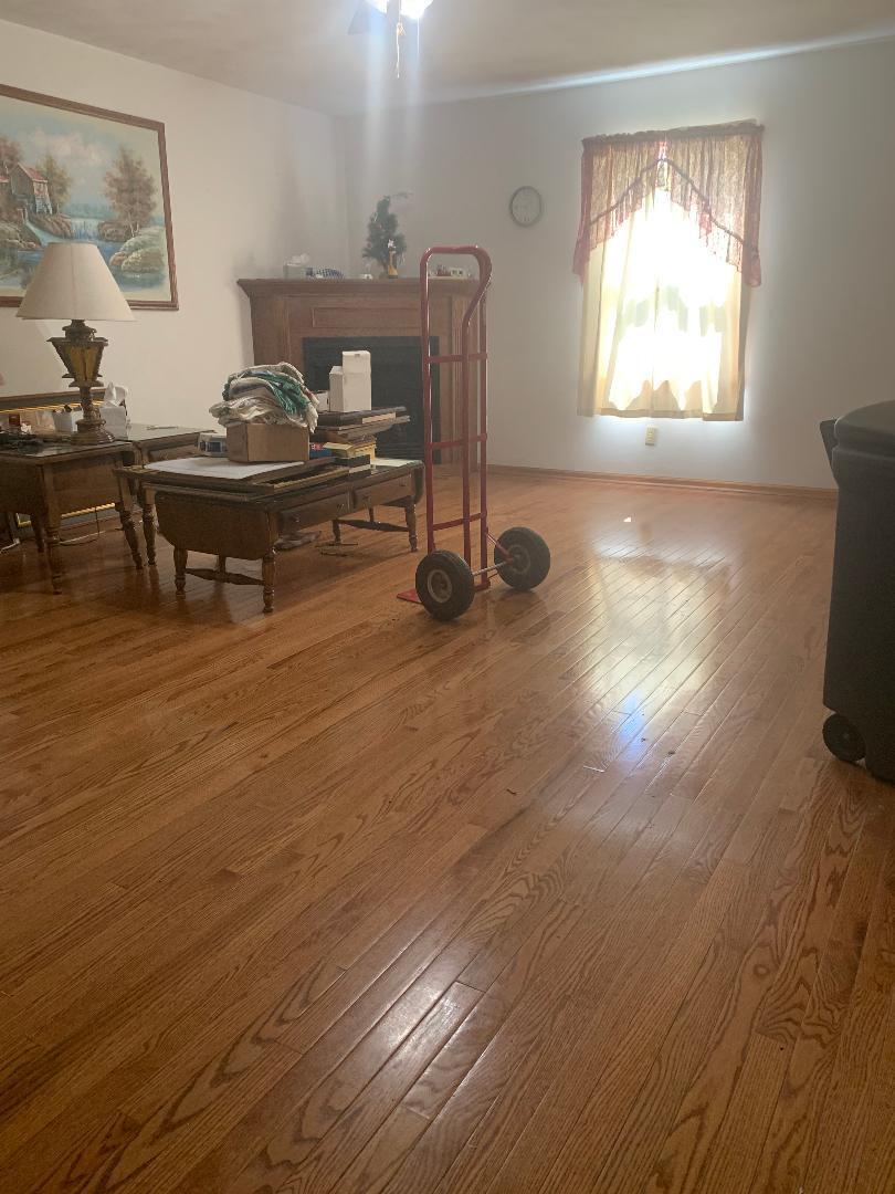 2210 Parrish Road, Unit 2214 Goodview, VA 24095 - Photo 4 of 6 a room with wooden floor and furniture