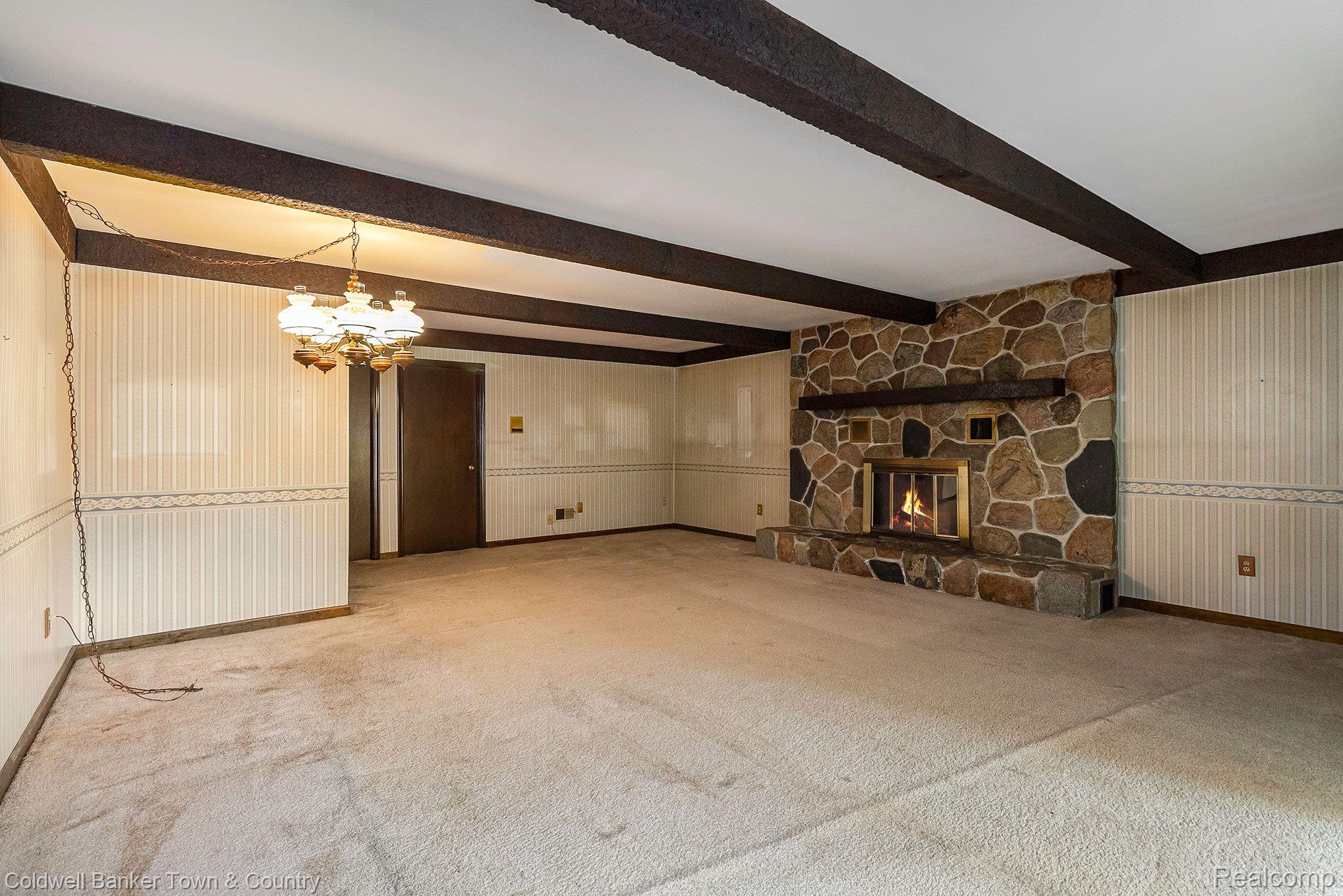 9233 Wiggins Road Howell, MI 48855 - Photo 17 of 28 Family Room Natural Fireplace