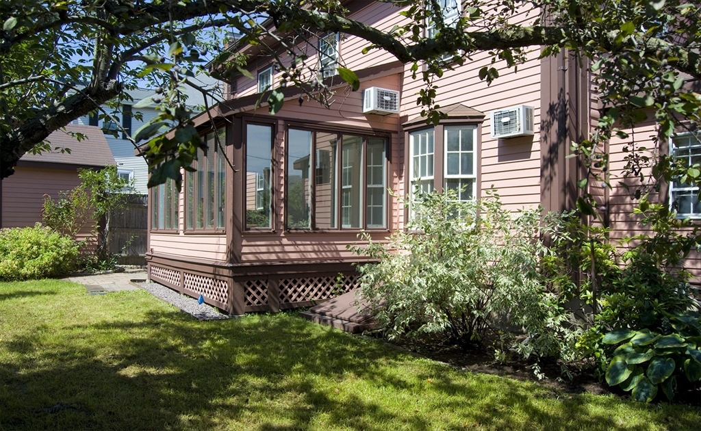 153 Watson Road Belmont, MA 02478 - Photo 16 of 20 a front view of a house with garden