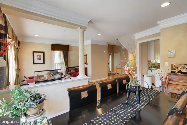 a large room with lots of furniture and garden view