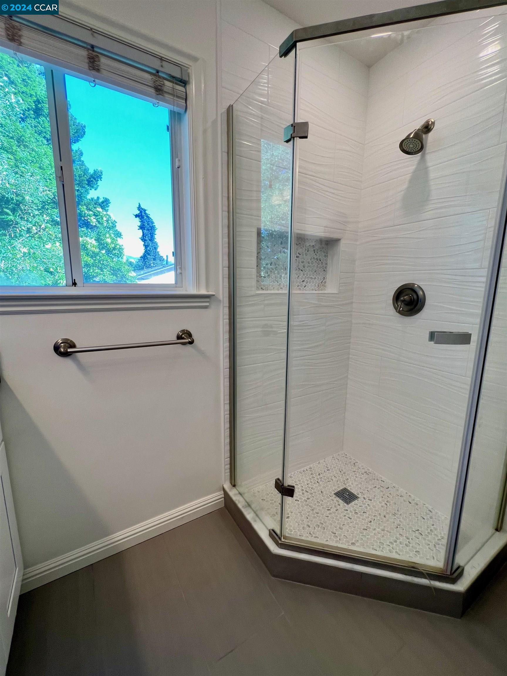 1282 Windermere Way Concord, CA 94521 - Photo 17 of 21 a bathroom with a shower