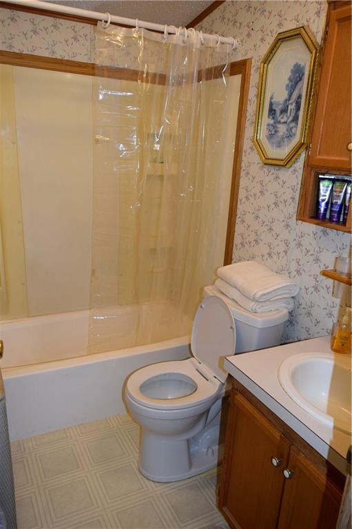 254 Piper Gross Road Latrobe, PA 15650 - Photo 19 of 42 a white toilet sitting next to a bath tub and a shower