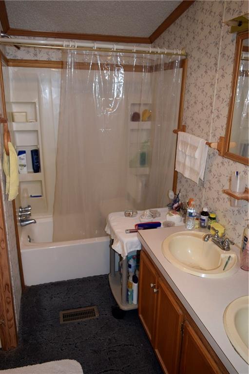 254 Piper Gross Road Latrobe, PA 15650 - Photo 25 of 42 a bathroom with a sink double vanity and a bathtub