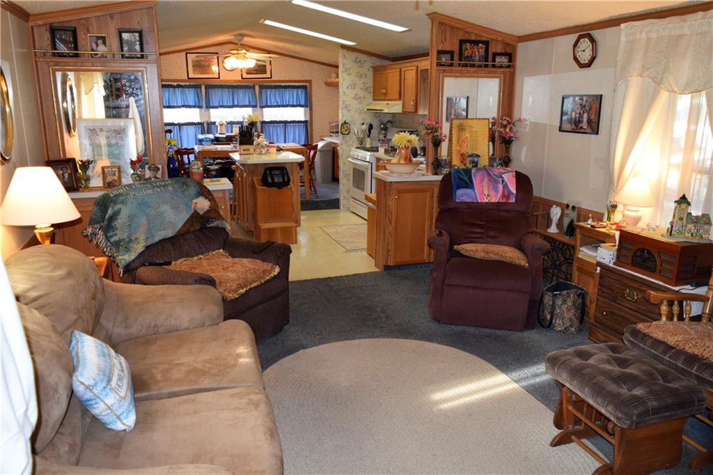 254 Piper Gross Road Latrobe, PA 15650 - Photo 32 of 42 a living room with furniture and a flat screen tv