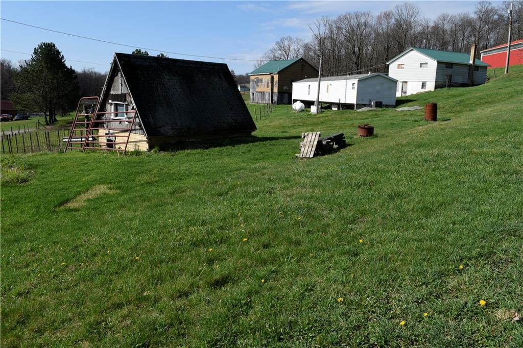254 Piper Gross Road Latrobe, PA 15650 - Photo 4 of 42 a view of a house with backyard