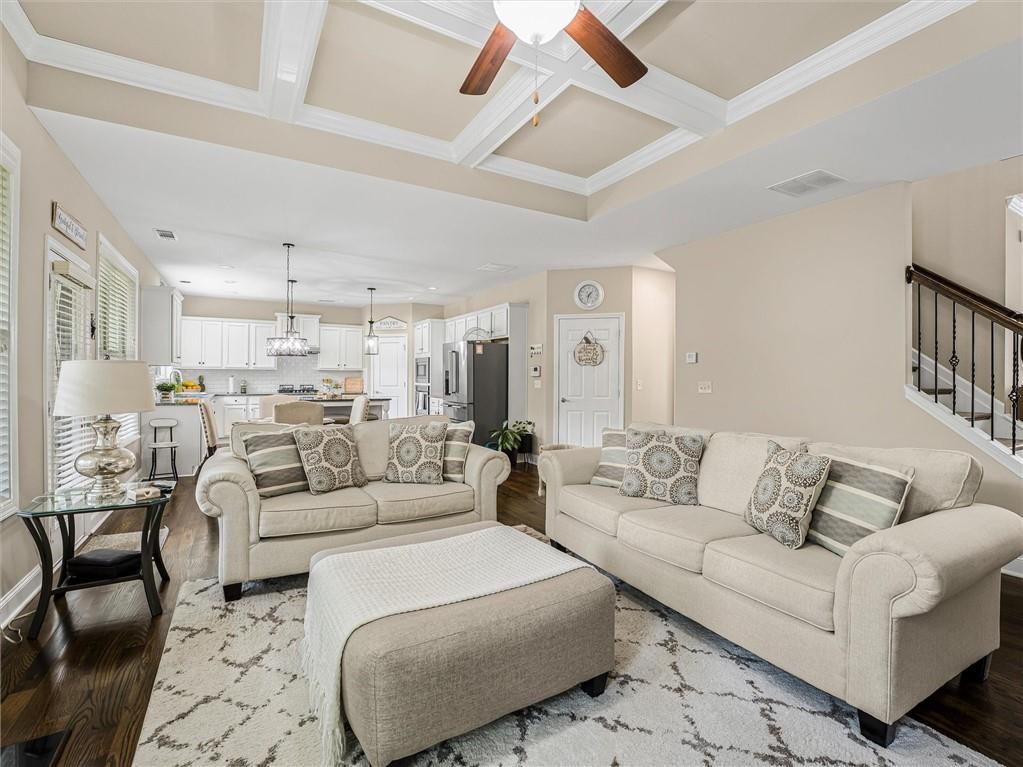 2297 Roberts View Trail Buford, GA 30519 - Photo 11 of 64 a living room with furniture white walls and white walls