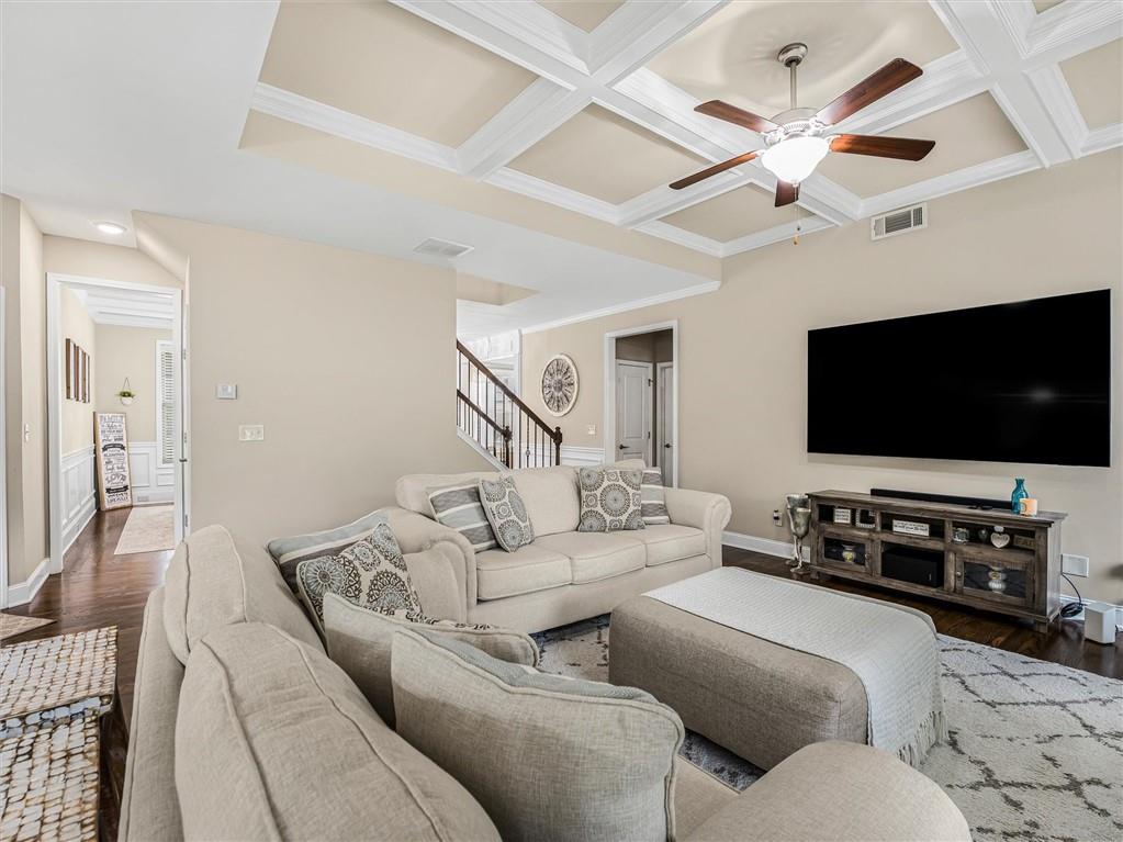 2297 Roberts View Trail Buford, GA 30519 - Photo 13 of 64 a living room with furniture and a flat screen tv