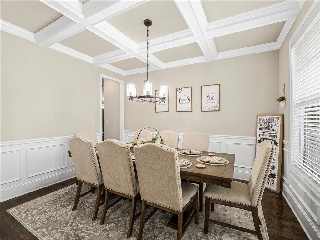 2297 Roberts View Trail Buford, GA 30519 - Photo 23 of 64 a view of a dining room with furniture and window