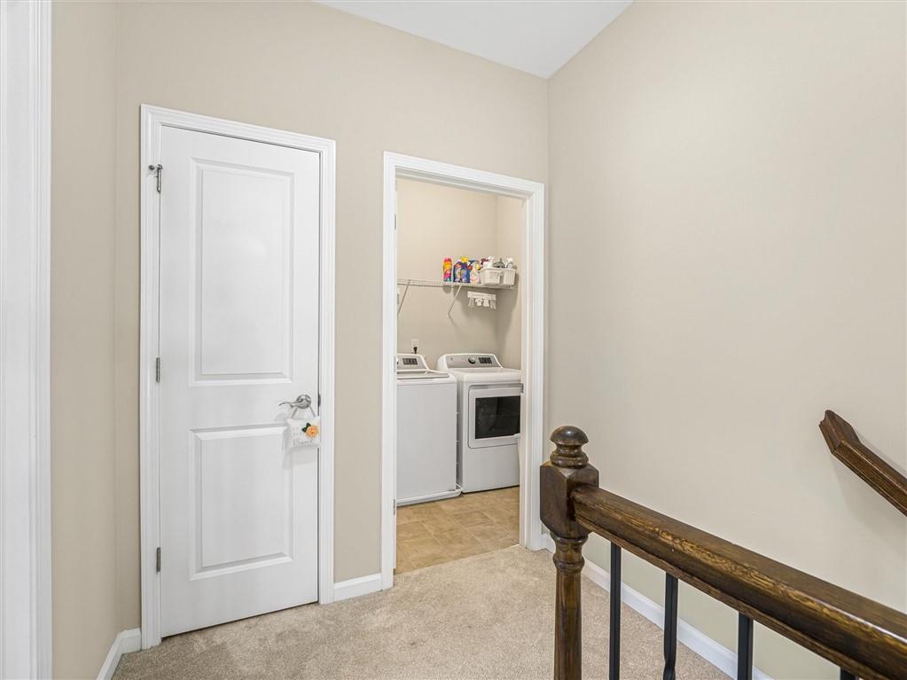 2297 Roberts View Trail Buford, GA 30519 - Photo 29 of 64 a view of a livingroom with a flat screen tv