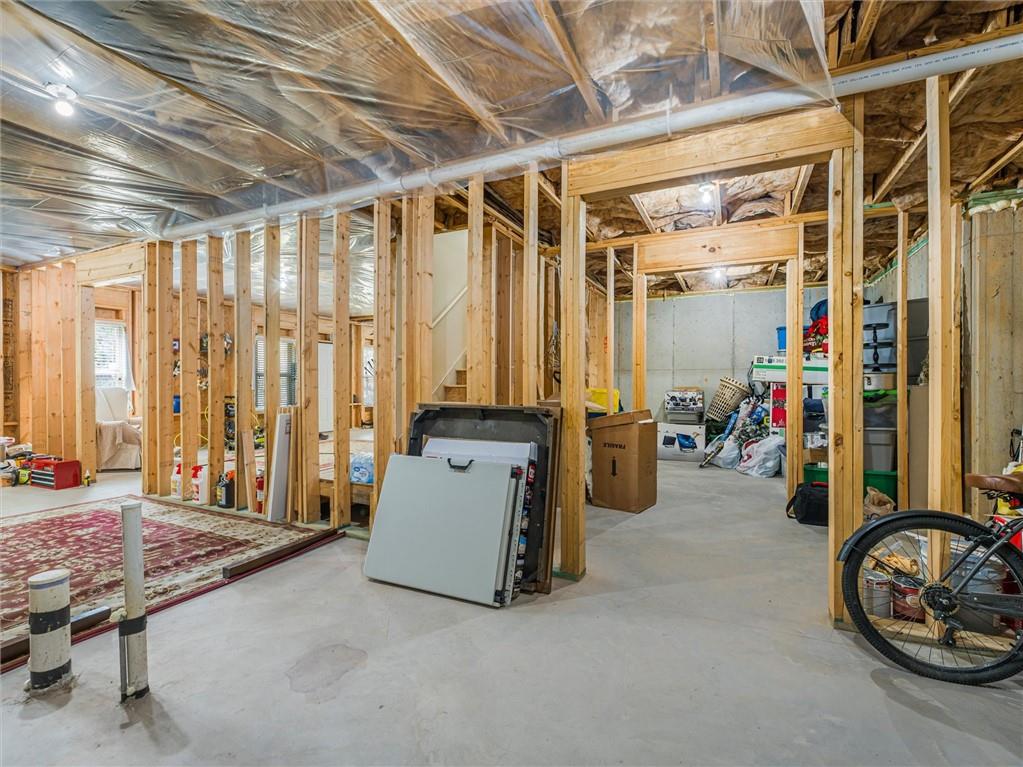 2297 Roberts View Trail Buford, GA 30519 - Photo 49 of 64 a view of a room with gym equipment