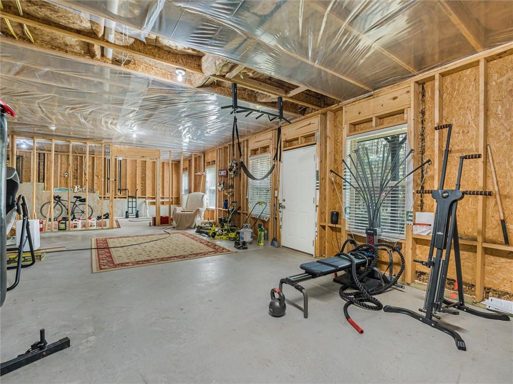 2297 Roberts View Trail Buford, GA 30519 - Photo 52 of 64 a view of a room with gym equipment
