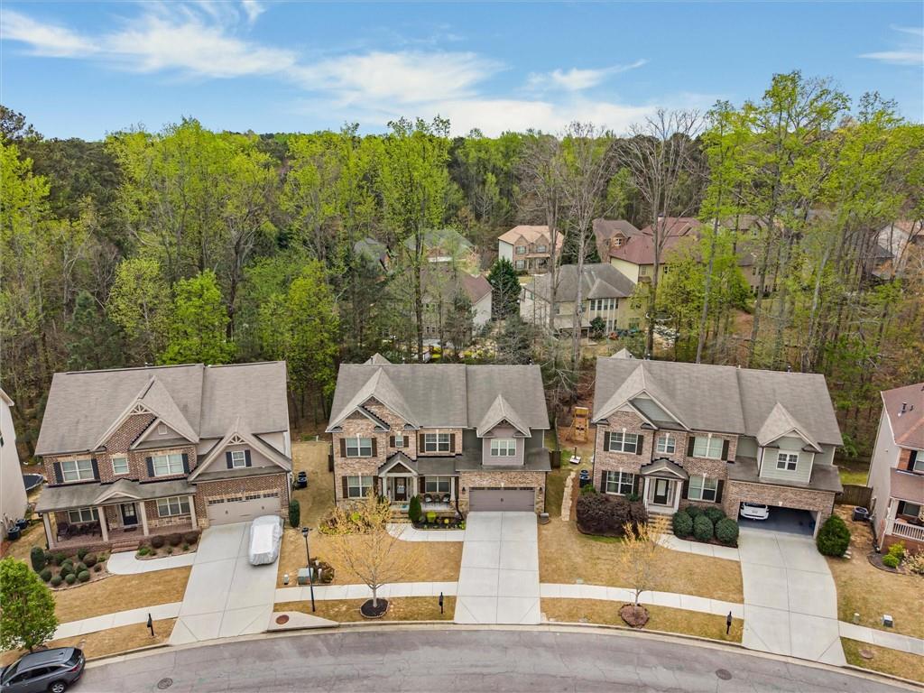 2297 Roberts View Trail Buford, GA 30519 - Photo 58 of 64 an aerial view of a house with a garden