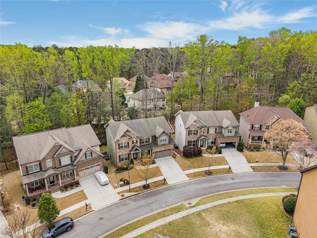 2297 Roberts View Trail Buford, GA 30519 - Photo 59 of 64 a view of a swimming pool with lounge chairs