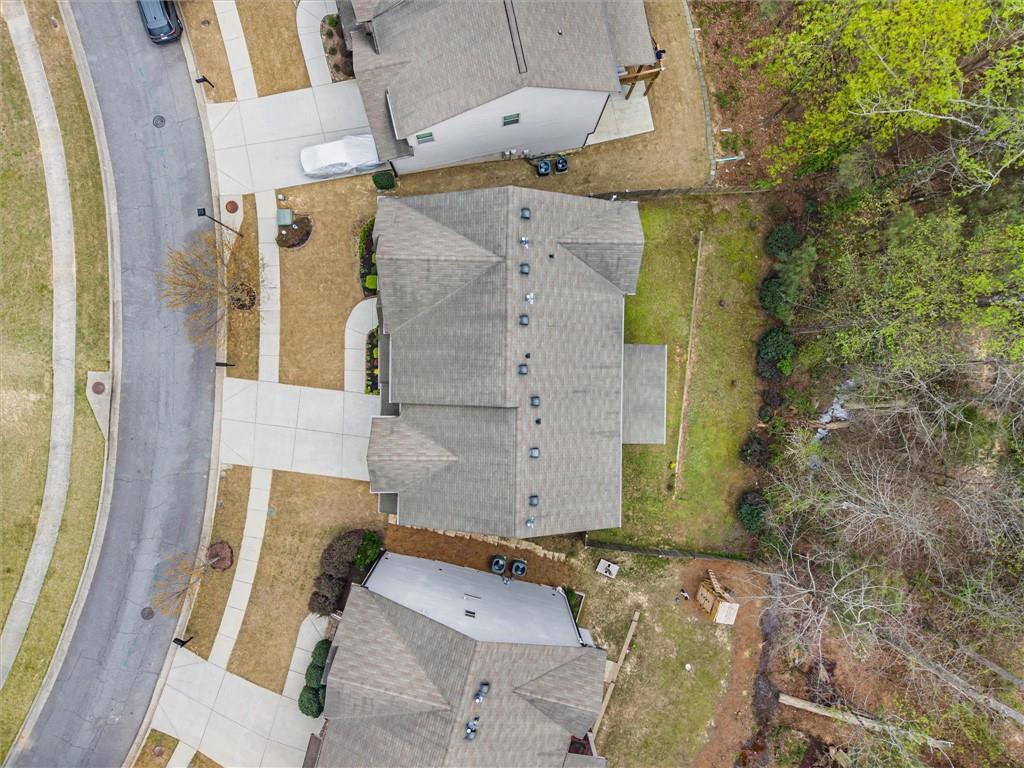 2297 Roberts View Trail Buford, GA 30519 - Photo 60 of 64 an aerial view of a house with a yard