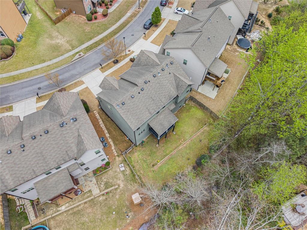 2297 Roberts View Trail Buford, GA 30519 - Photo 61 of 64 an aerial view of a house with a yard