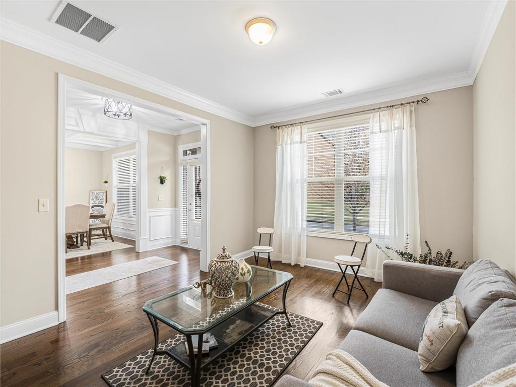 2297 Roberts View Trail Buford, GA 30519 - Photo 7 of 64 a living room with furniture and a large window