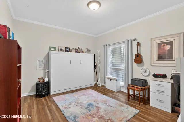 a room with furniture and a book shelf