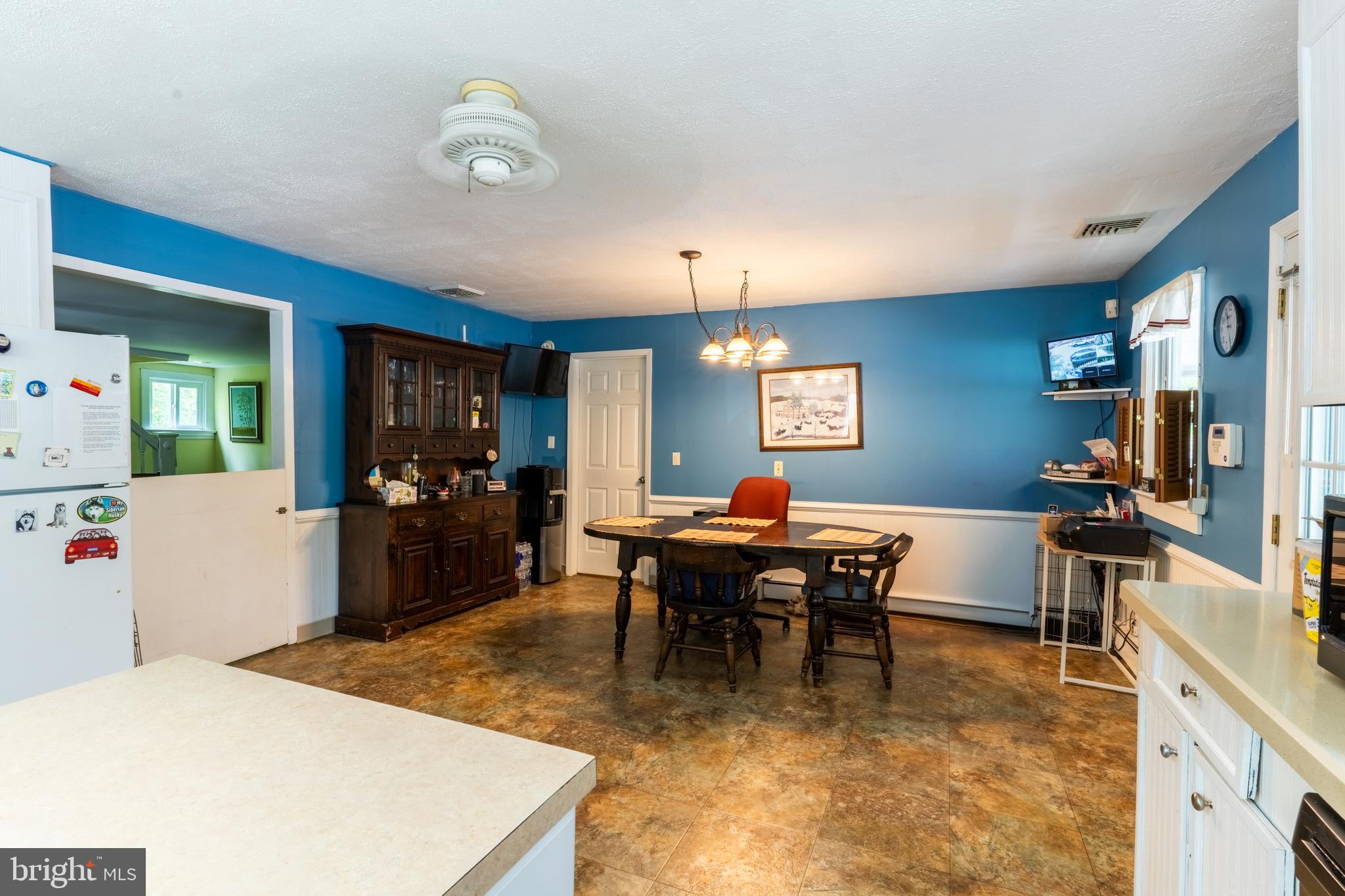 713 Monmouth Road Chesterfield, NJ 08515 - Photo 14 of 25 a view of a dining room with furniture