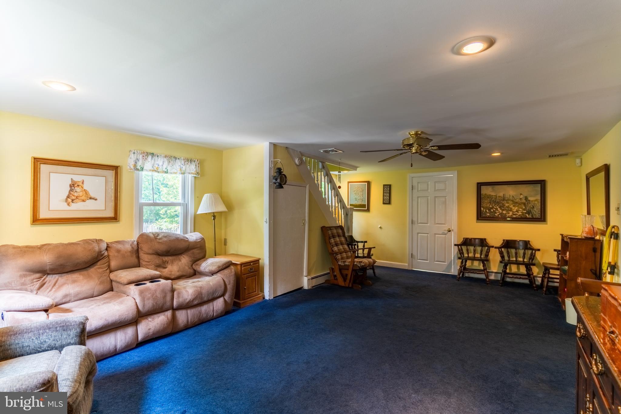 713 Monmouth Road Chesterfield, NJ 08515 - Photo 17 of 25 a living room with furniture and a window