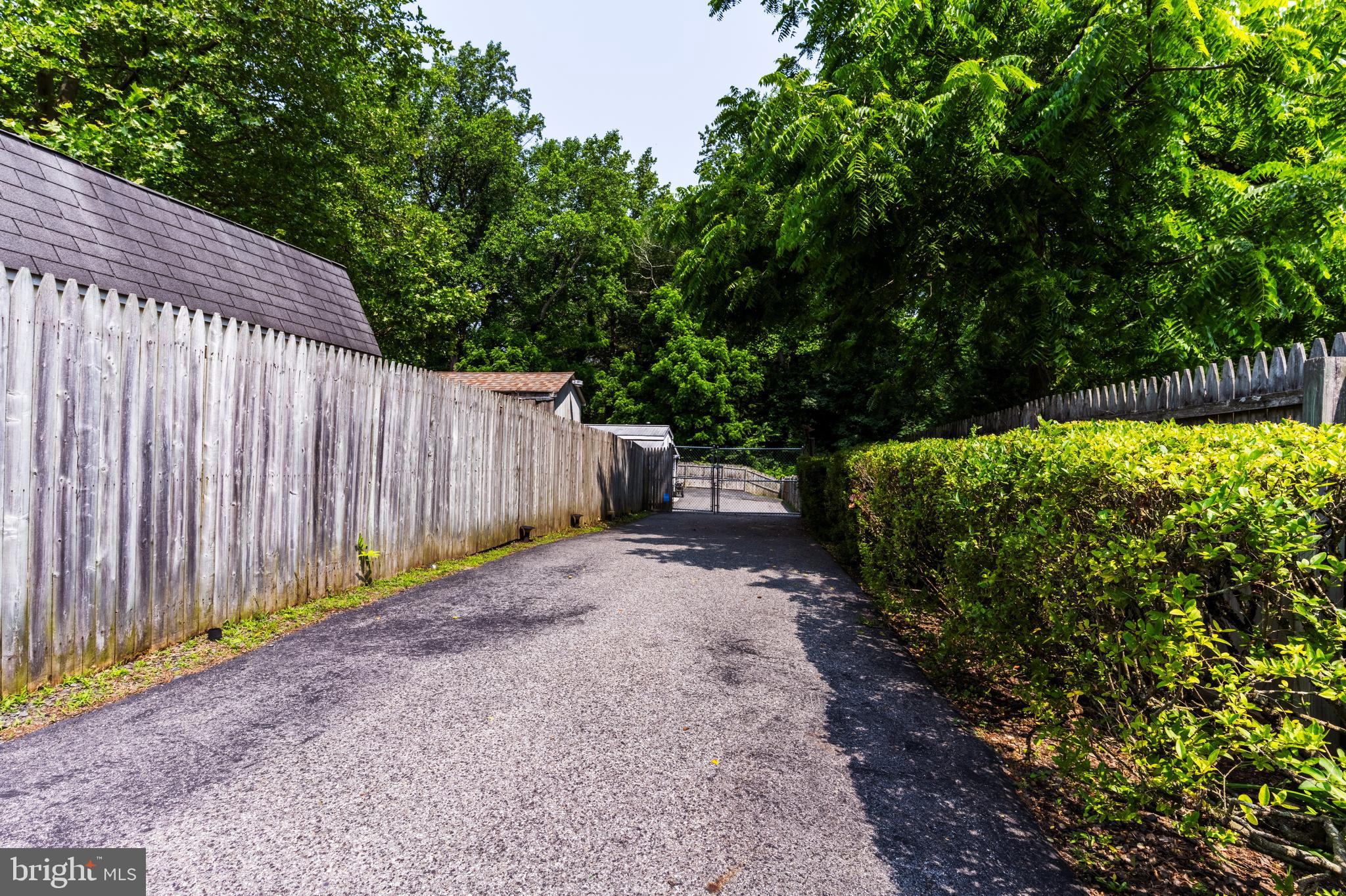 713 Monmouth Road Chesterfield, NJ 08515 - Photo 8 of 25 a backyard of a house with lots of green space
