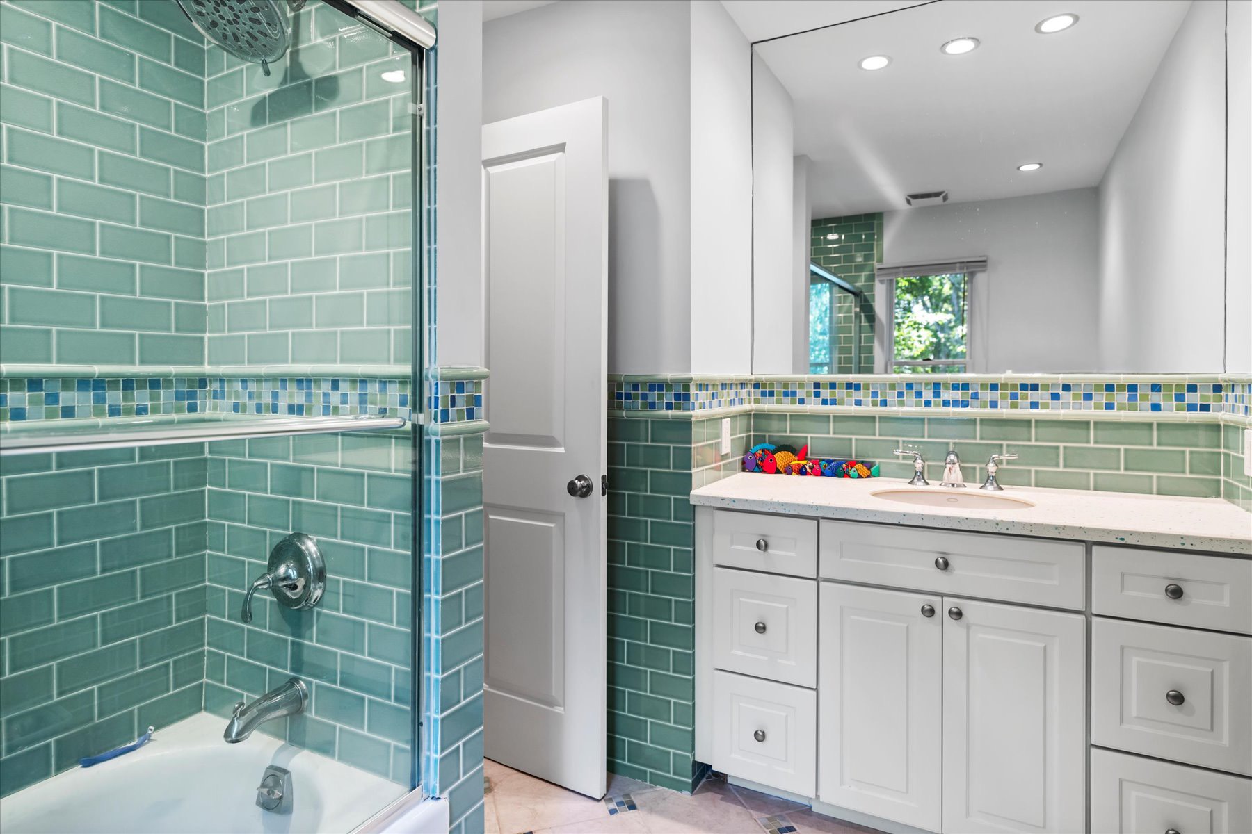 11 Deer Trail Road Southampton, NY 11968 - Photo 14 of 24 a bathroom with a sink a toilet and shower