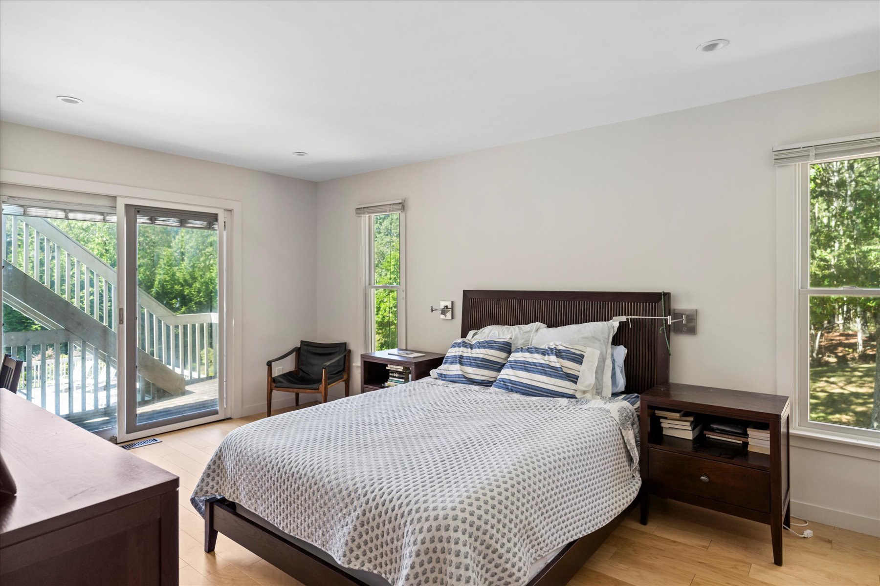 11 Deer Trail Road Southampton, NY 11968 - Photo 17 of 24 a bedroom with a bed and a window