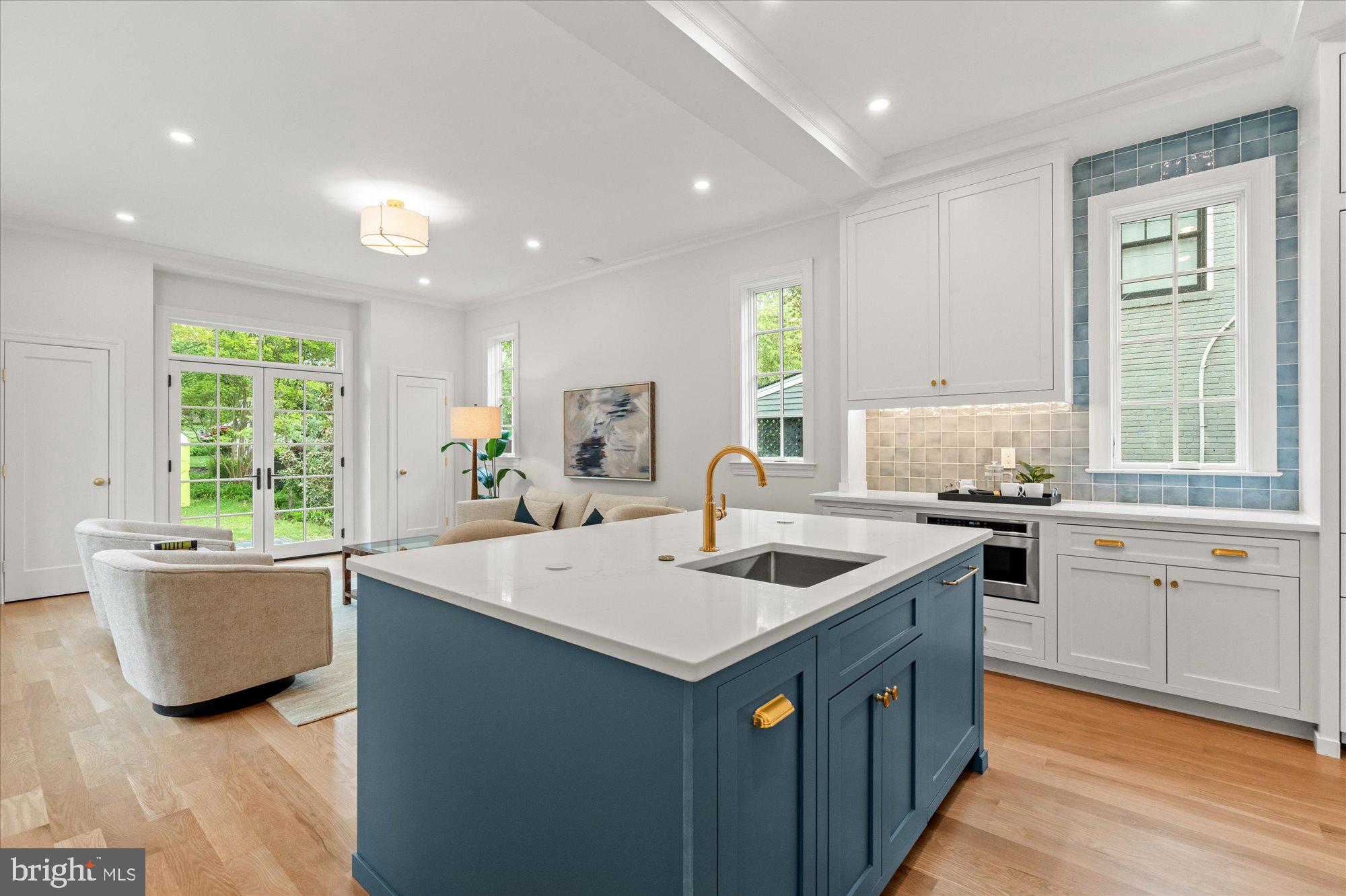 1004 Virginia Avenue Alexandria, VA 22302 - Photo 11 of 63 a kitchen that has a sink and a stove in it