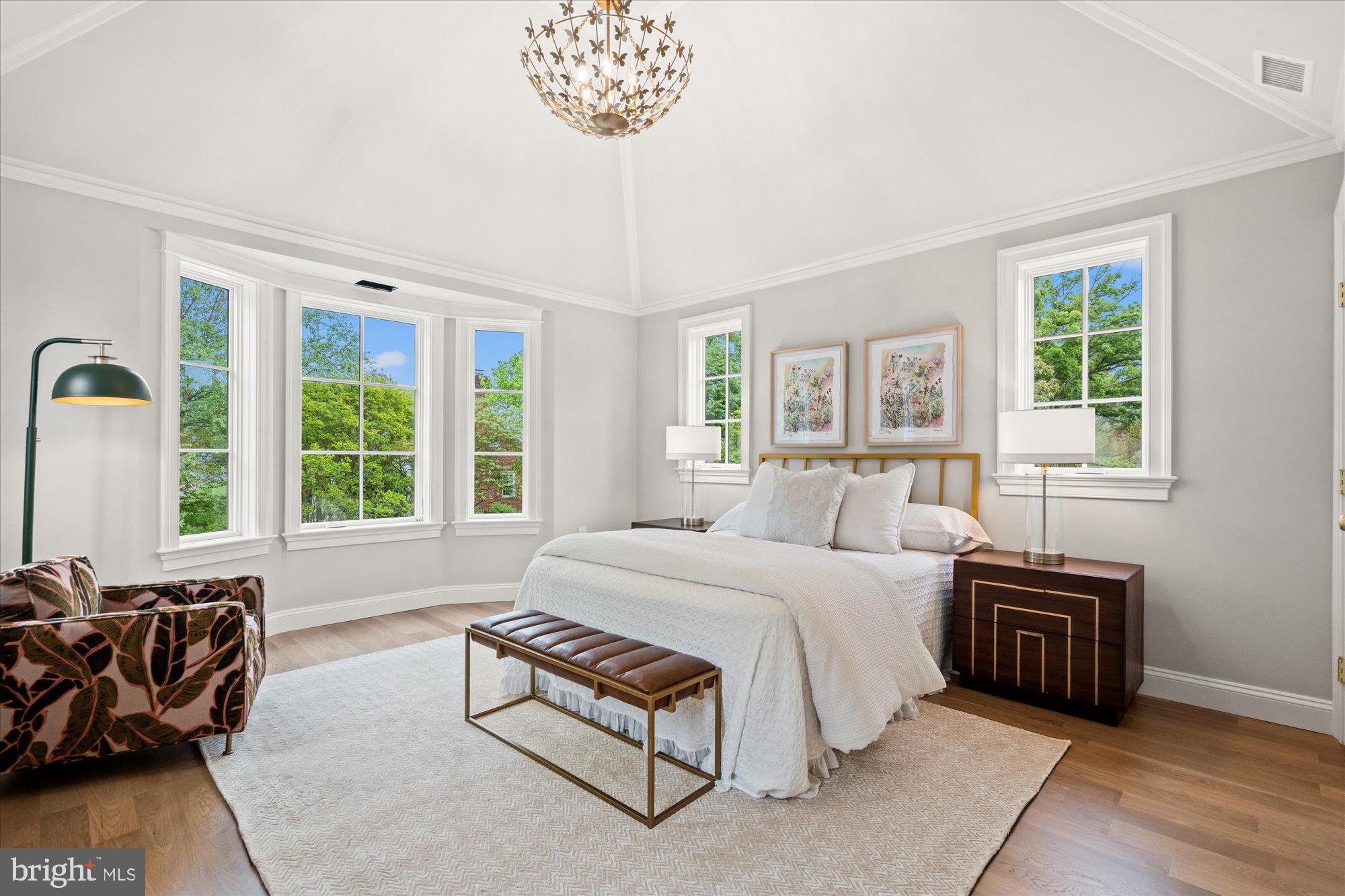 1004 Virginia Avenue Alexandria, VA 22302 - Photo 27 of 63 a spacious bedroom with a bed a couch and a large window