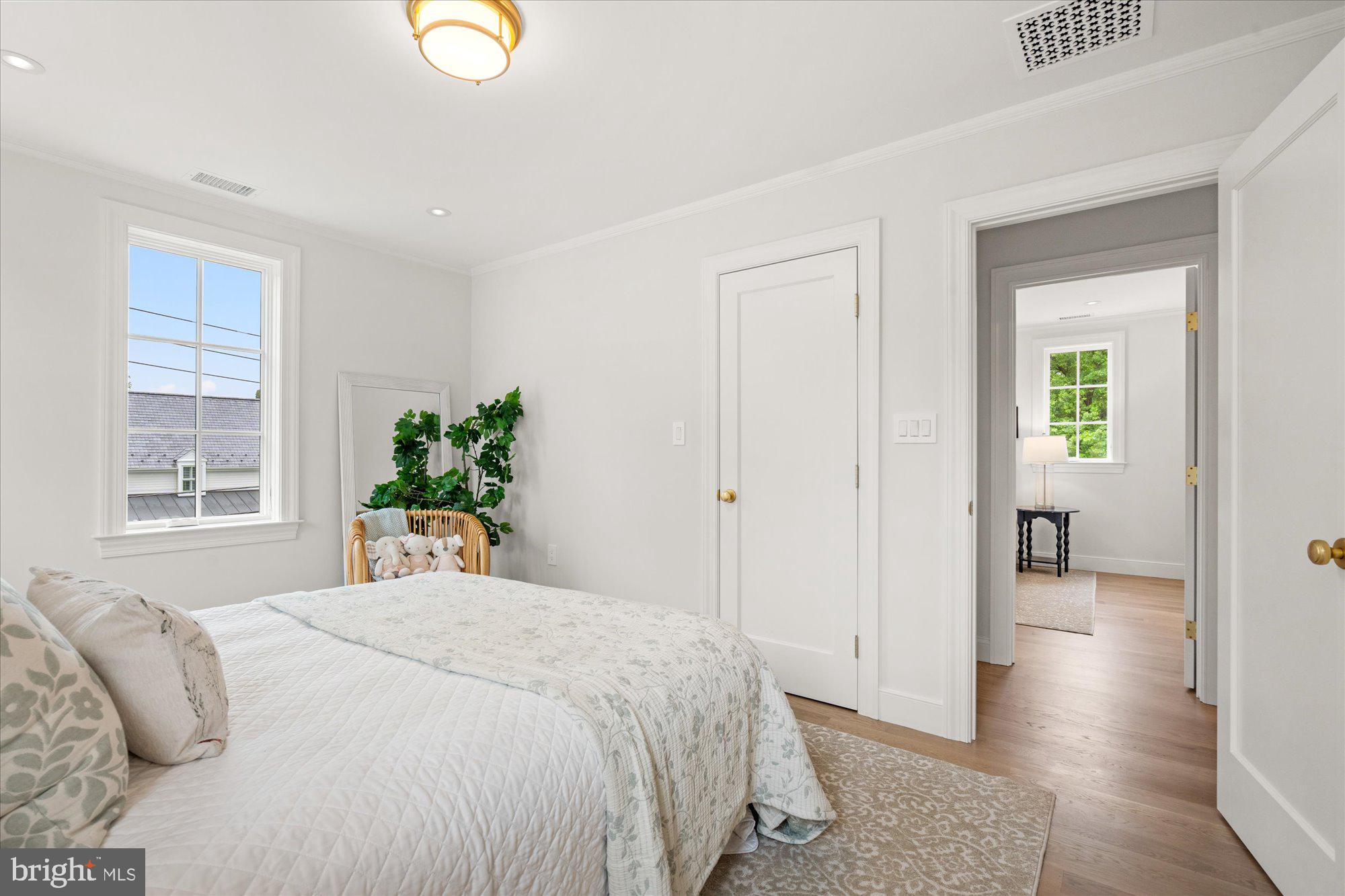 1004 Virginia Avenue Alexandria, VA 22302 - Photo 36 of 63 a bedroom with a bed and a window