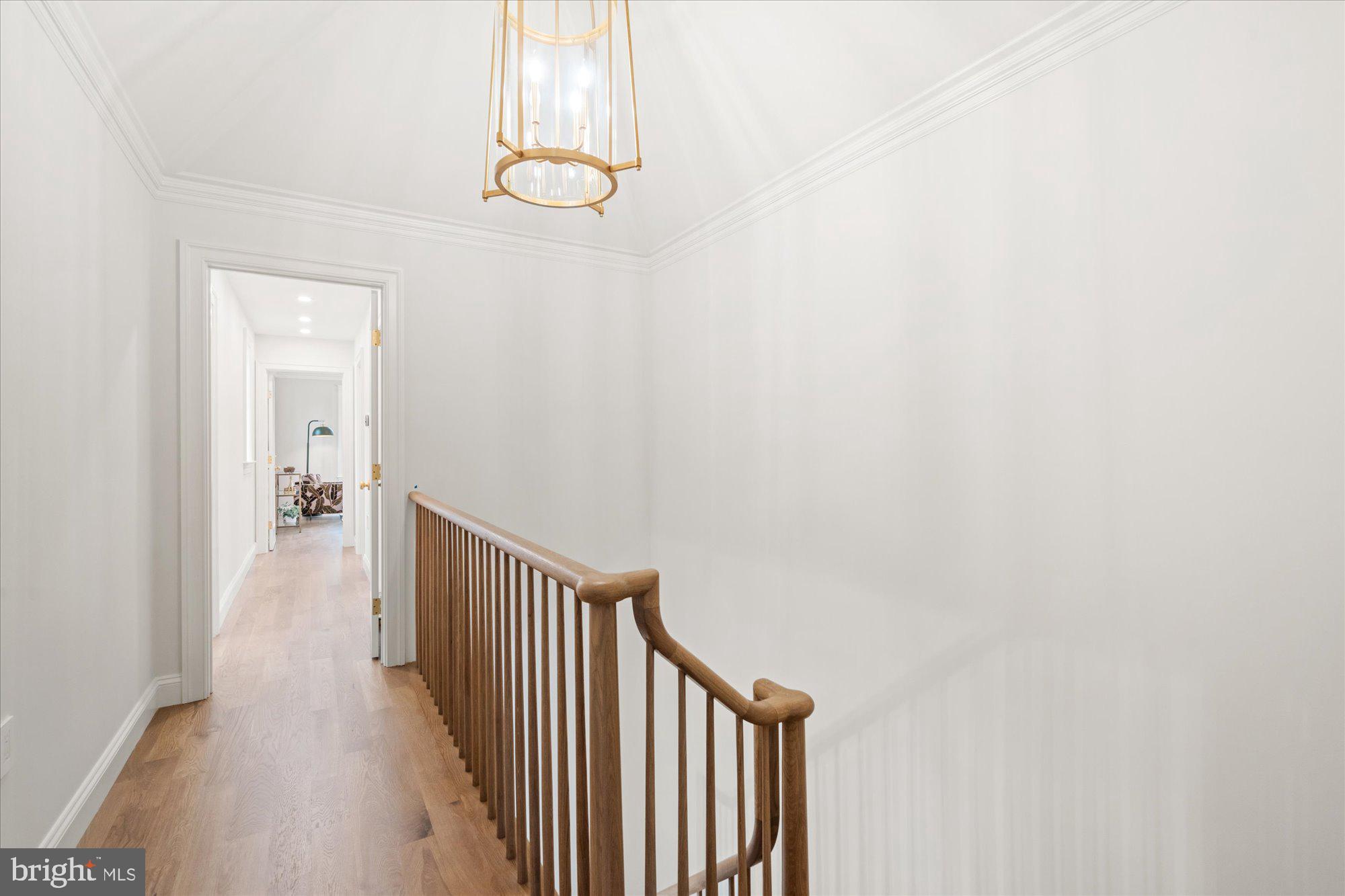 1004 Virginia Avenue Alexandria, VA 22302 - Photo 43 of 63 a view of a hallway with wooden floor and staircase