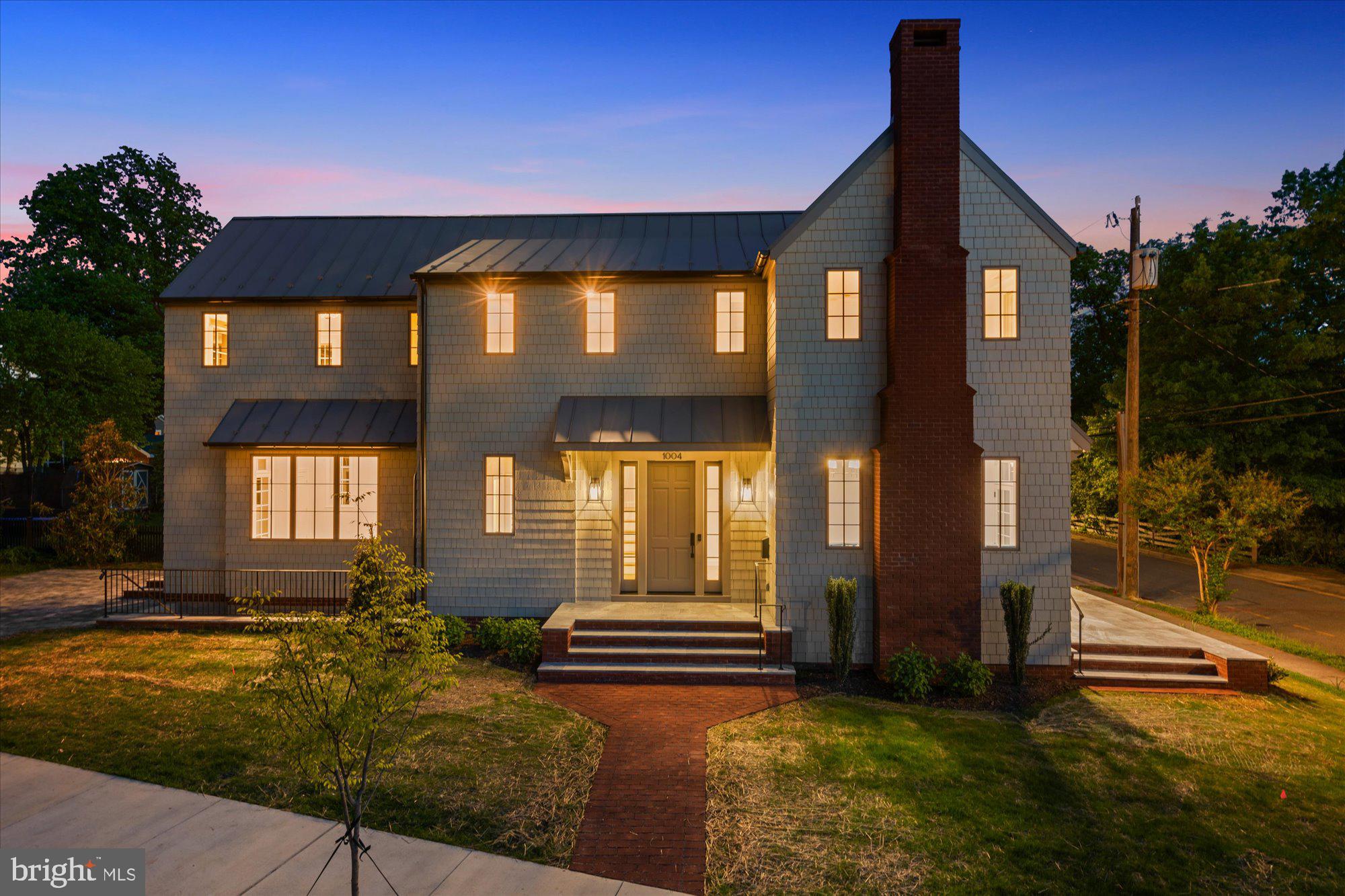 1004 Virginia Avenue Alexandria, VA 22302 - Photo 58 of 63 a front view of a house with a yard