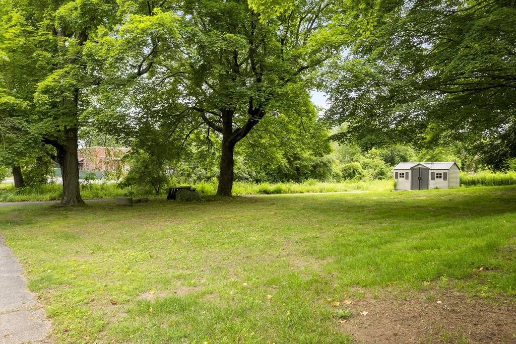 35 R Whiting Street North Attleboro, MA 02760 - Photo 12 of 16 a front view of a house with a big yard