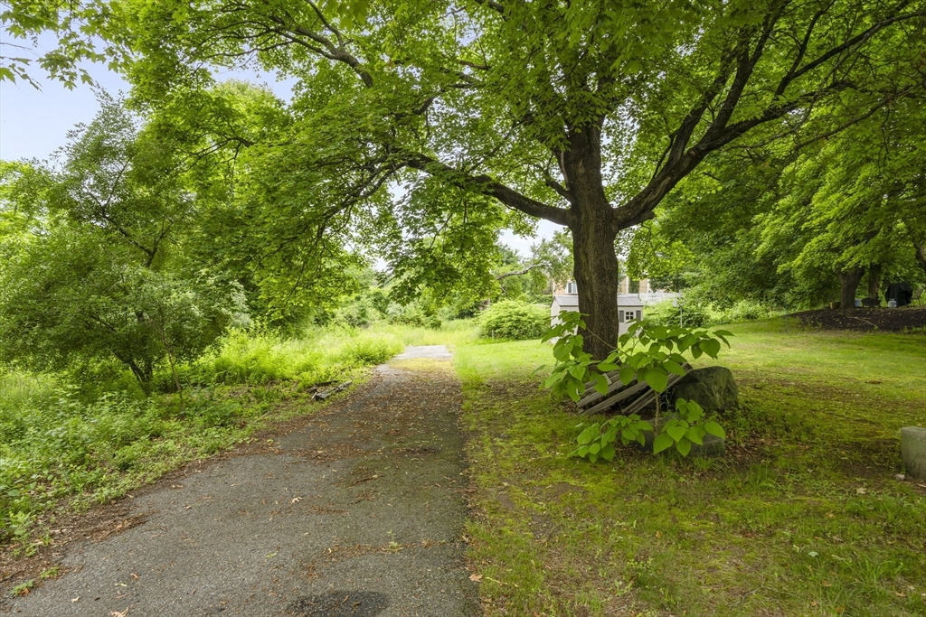 35 R Whiting Street North Attleboro, MA 02760 - Photo 14 of 16 a backyard of a house with lots of green space