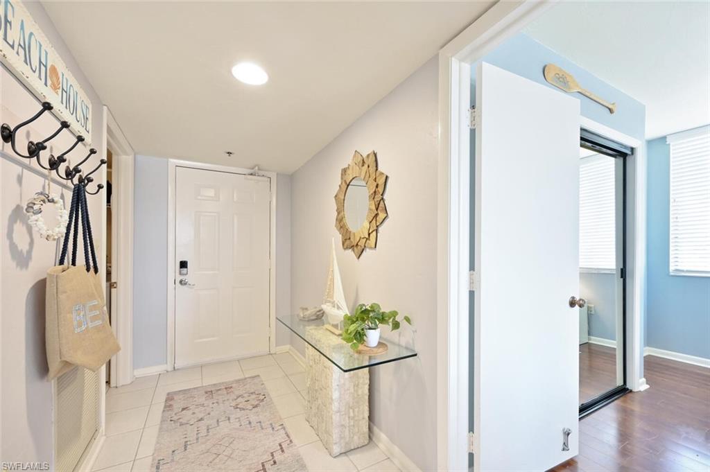 17 Bluebill Avenue, Unit 101 Naples, FL 34108 - Photo 6 of 23 a view of a hallway and interior of the house
