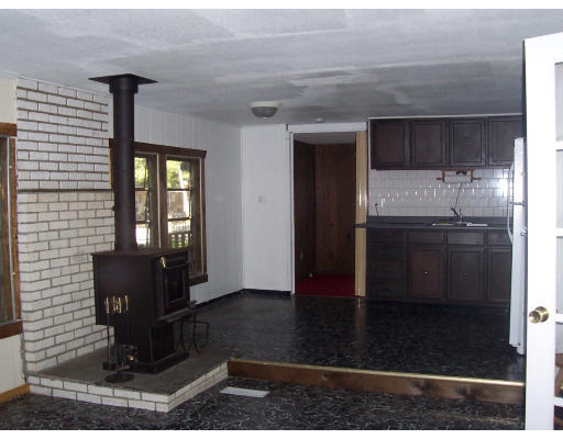 301-58 Bulgarmarsh Road Tiverton, RI 02878 - Photo 5 of 8 a kitchen with a sink and cabinets