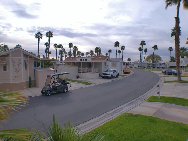 a view of a street with cars