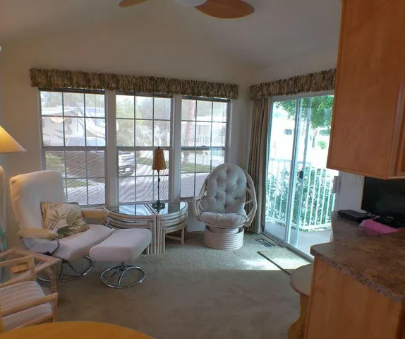 a kitchen with a stove microwave and cabinets