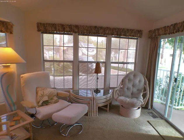 a kitchen with granite countertop a sink stove and refrigerator