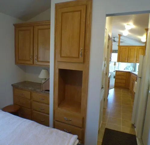 a room with closet and mirror