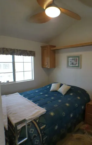 a bathroom with a tub and shower