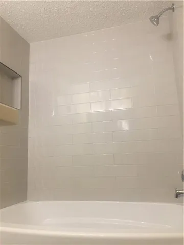 a bathroom with a bathtub