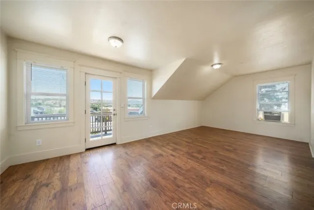 a kitchen with a stove a sink and a refrigerator