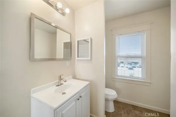 a bathroom with a bathtub and a toilet