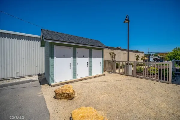 a aerial view of a house with a yard