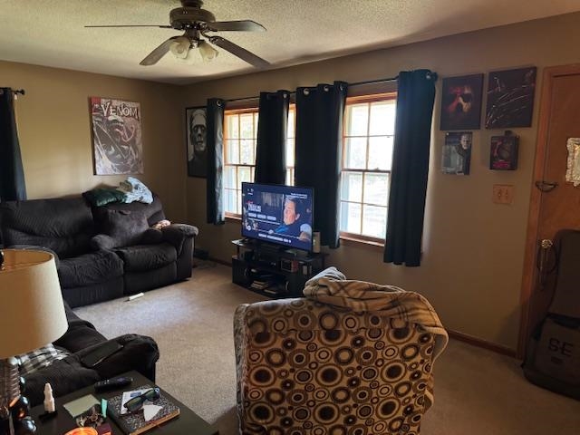 785 Lake Hardeman Road Hickory Valley, TN 38042 - Photo 5 of 10 a living room with furniture and a window