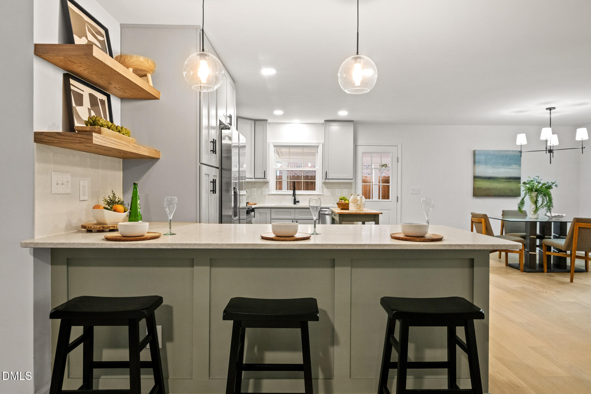 3509 Morningside Drive Raleigh, NC 27607 - Photo 7 of 49 a kitchen with a table and chairs in it