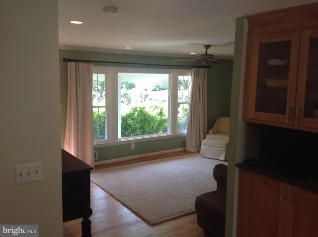 a room with furniture and a window