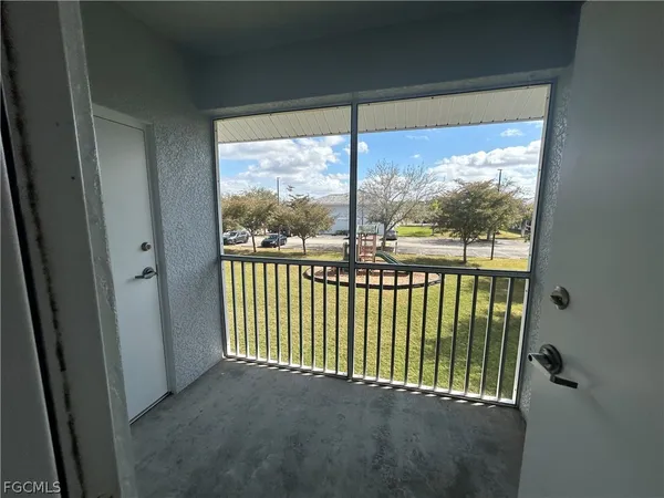 a view of a room with a large window