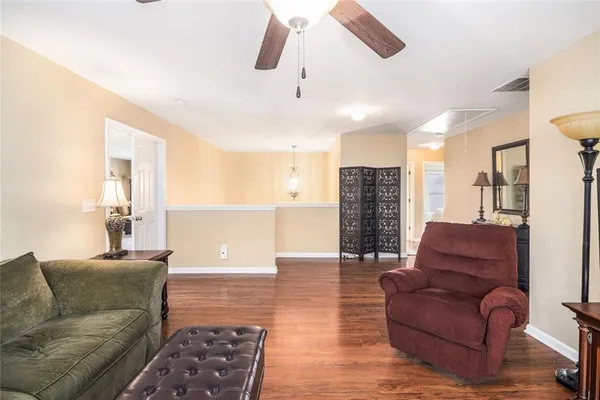 a living room with furniture and a couch