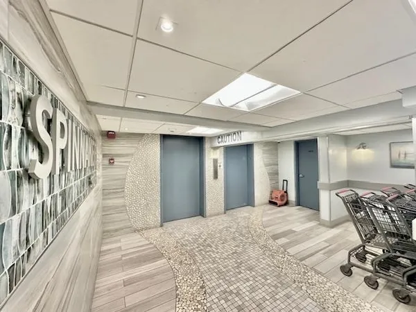 a view of a livingroom with wooden floor